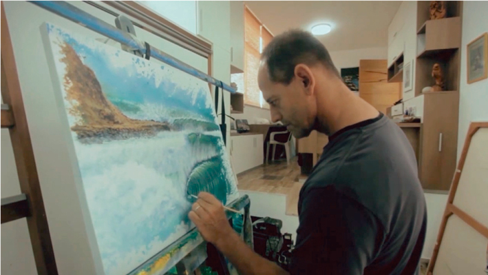 Flavio Caporali plasma su arte para evento de Quiksilver
